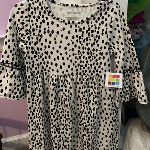 Girls polka dot dress with ruffled sleeves. Size 4T NWT